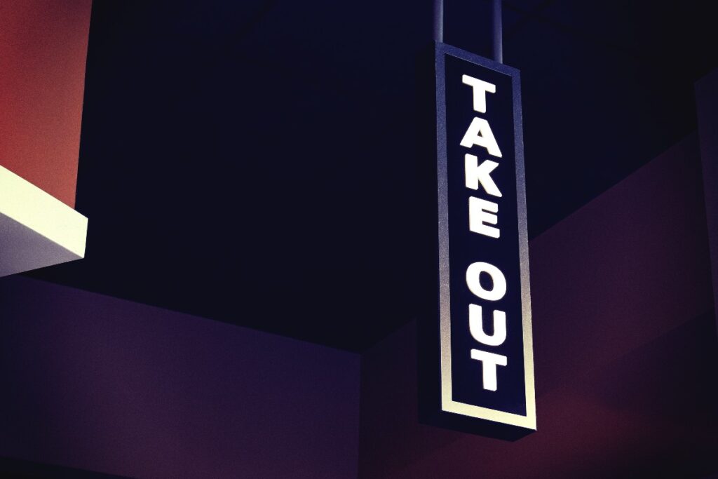 A sign that reads "take out"
