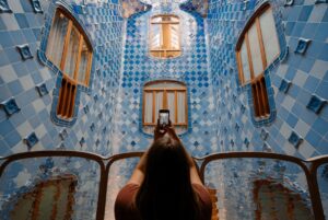 A woman taking a selfie of a building